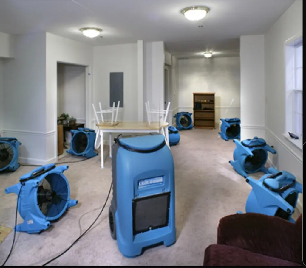 Air movers and dehumidifier setup for Water Damage Restoration in Cayce