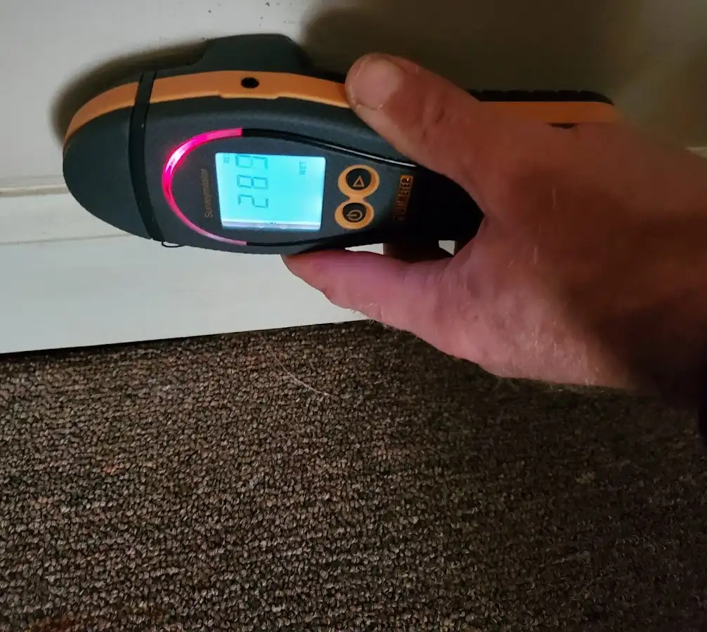 Moisture detection at baseboard during Burst Pipe Cleanup in Cayce
